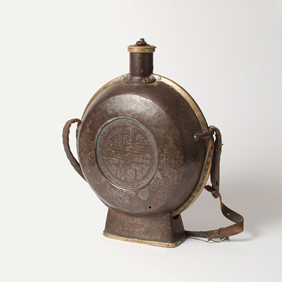 An iron pilgrim flask and cover, Eastern Tibet, probably Chamdo, 18th century