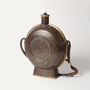 An iron pilgrim flask and cover - Eastern Tibet, probably Chamdo, 18th century
