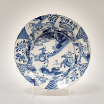 Blue and white porcelain dish in the Kraak style - China, Kangxi, circa 1700