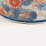 Imari porcelain chocolate bowl and associated saucer (Bowl, rim, close-up of nick (1)), China, Qing Dynasty, Kangxi, early 18th century [thumbnail]