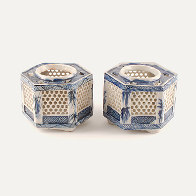 A pair of blue and white candle-holders, China, Qing Dynasty, mid 19th century
